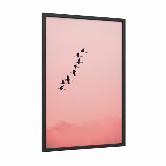 Pink Migration framed crane print — black wood frame — salmon pink and white palette