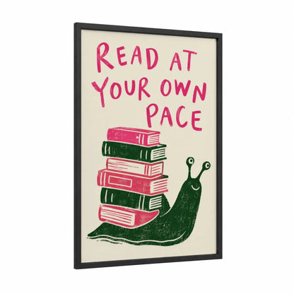 Reading Snail With Books Wall Art framed art print — black wood frame — pink and dark green palette