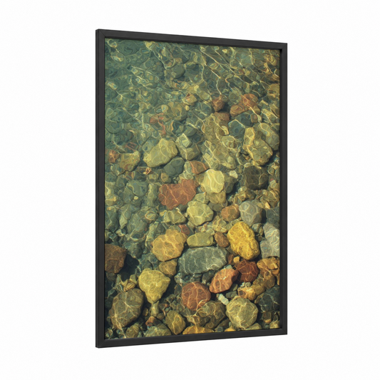 Sunlit River Stones framed natural stones print — black wood frame — gold and sage green palette