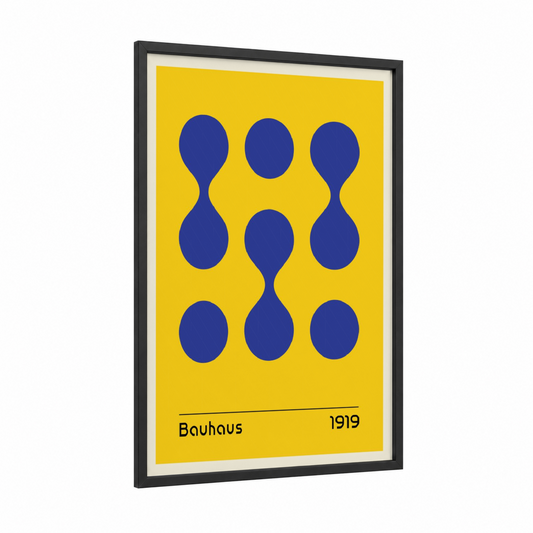 Bauhaus Circles framed abstract geometric print — black wood frame — yellow and royal blue palette