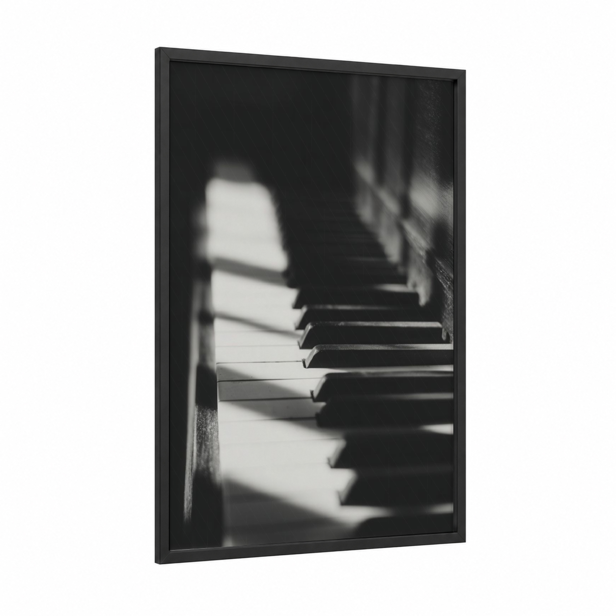 Sunlit Piano Keys framed art print — black wood frame — black and white palette