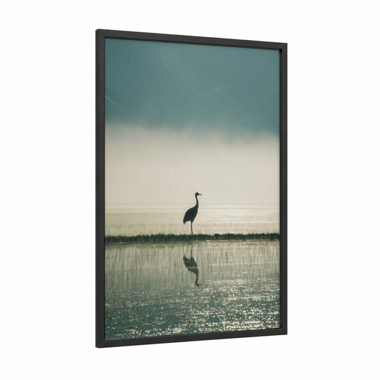 Solitary Crane framed art print — black wood frame — sage green and cream palette