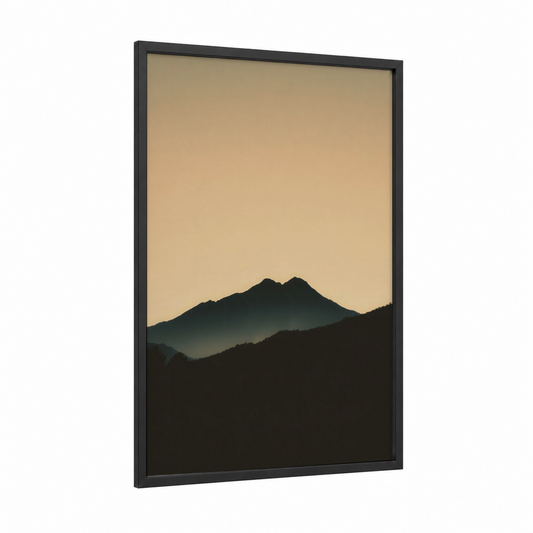 Alpine Silhouette framed alps print — black wood frame — black and peach palette