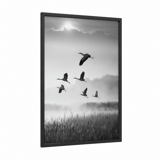 Misty Heron Flight framed art print — black wood frame — black and white and gray palette
