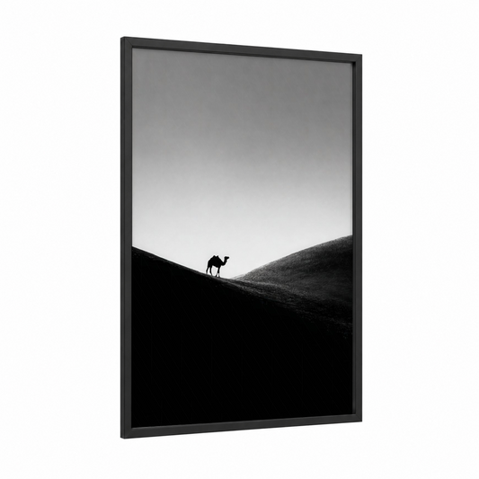 Desert Solitude Camel framed art print — black wood frame — black and white and gray palette