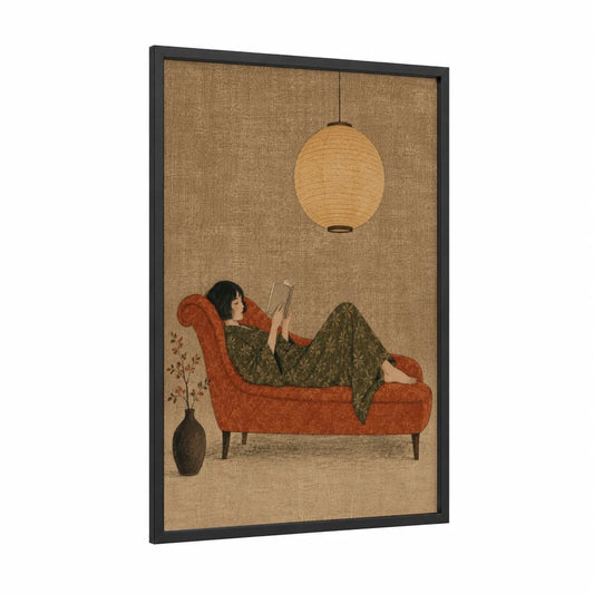 Woman Reading on Chaise Wall Art framed art print — black wood frame — beige and orange palette