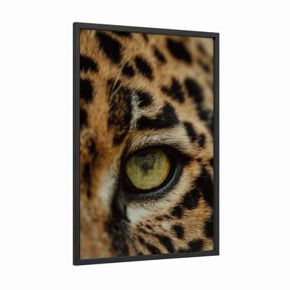 Golden Jaguar Eye framed art print — black wood frame — brown and gold palette