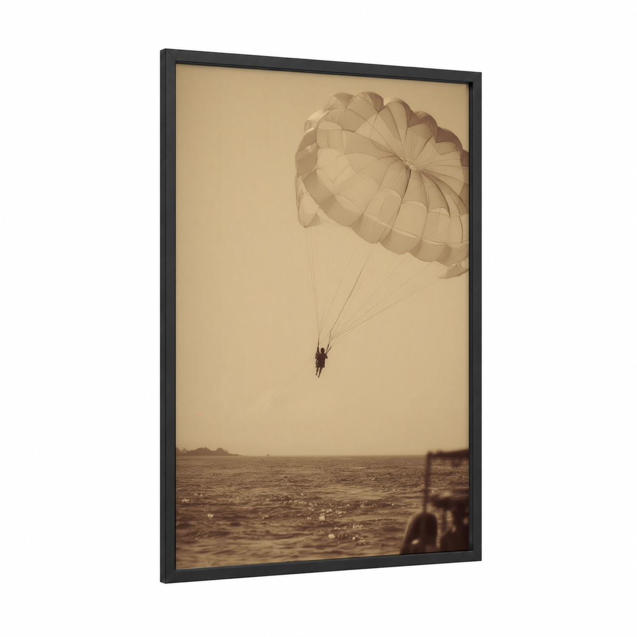 Coastal Parasailing framed art print — black wood frame — beige and cream palette