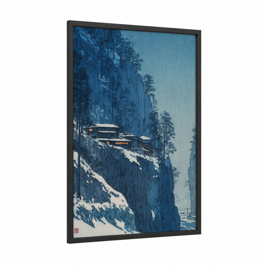 Snowy Cliff Refuge framed art print — black wood frame — blue and white palette