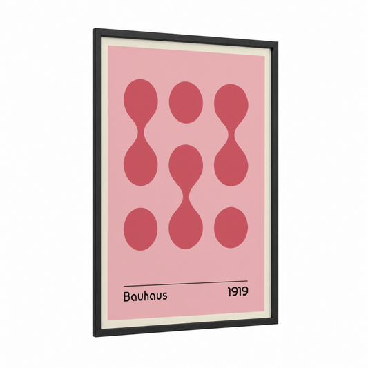 Bauhaus Circles framed abstract geometric print — black wood frame — pink and rose gold palette