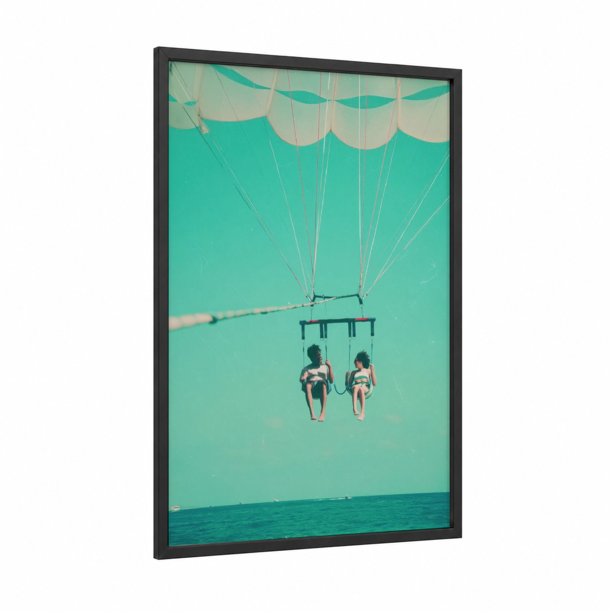 Turquoise Parasailing framed art print — black wood frame — turquoise and aquamarine palette