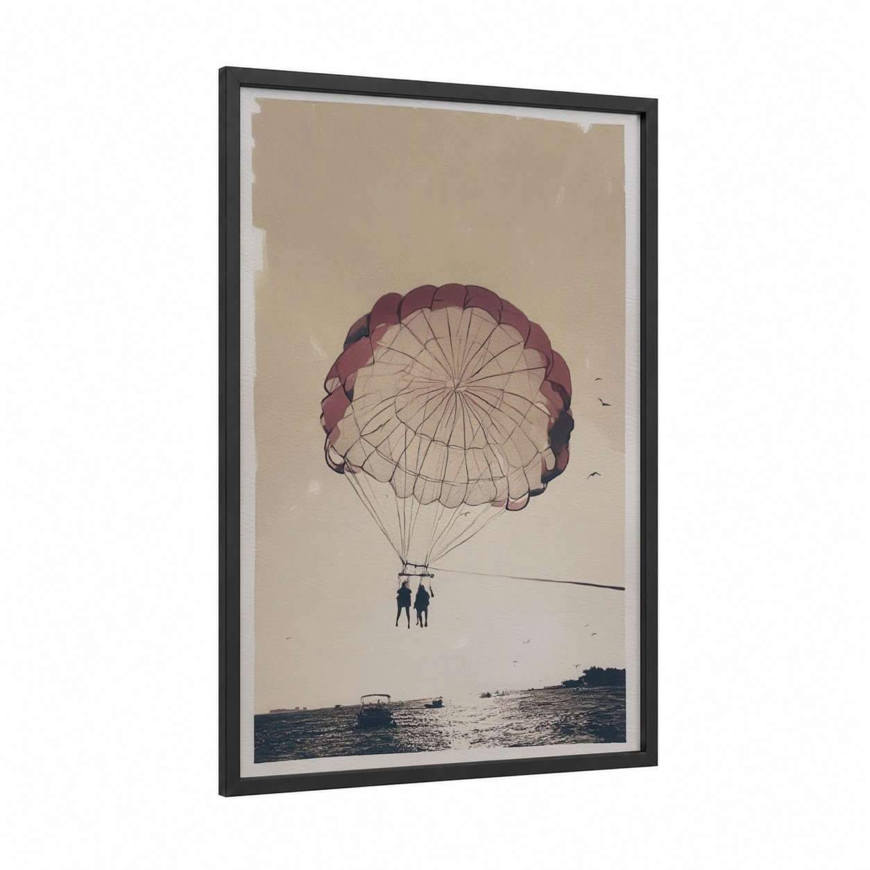 Seaside Parasailing framed art print — black wood frame — beige and maroon palette