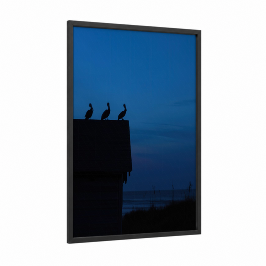 Cliff Herons Dusk framed art print — black wood frame — dark blue and blue palette
