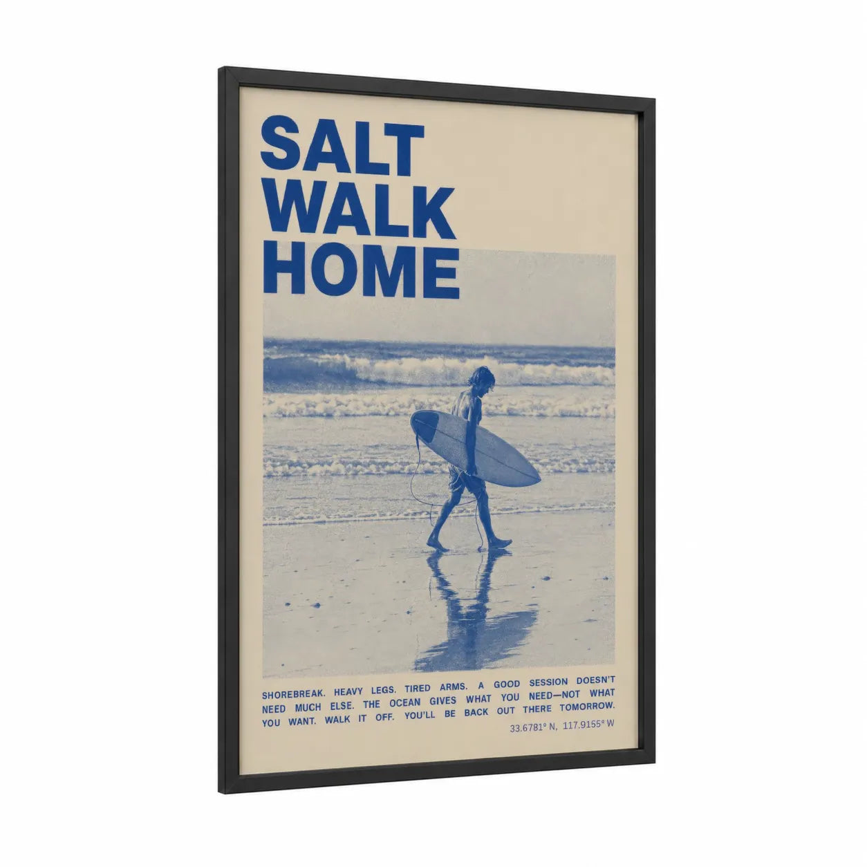 Surfer Walking Sandy Beach Wall Art framed surfing print — black wood frame — blue and cream palette