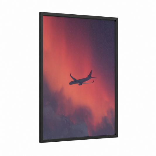Sunset Flight framed commercial plane print — black wood frame — salmon pink and purple palette