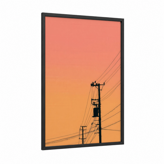 Sunset Power Lines framed art print — black wood frame — orange and gold palette