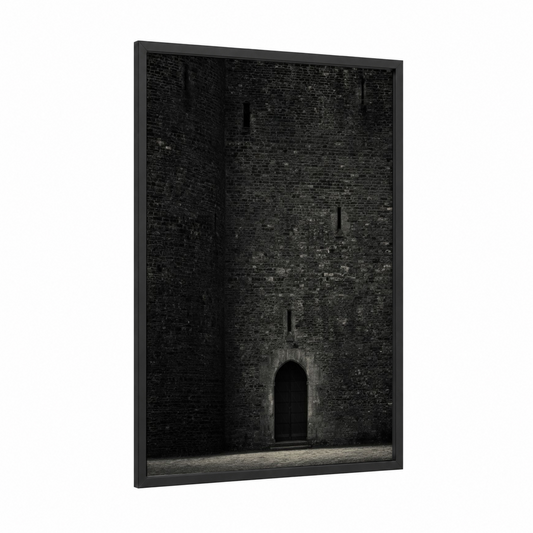 Fortified Stone Door framed masonry print — black wood frame — black and white and gray palette