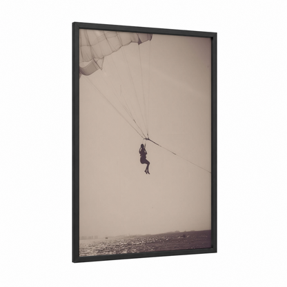 Coastal Parasailing framed art print — black wood frame — beige and gray palette