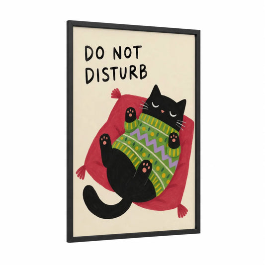 Sleeping Black Cat on Cushion Wall Art framed art print — black wood frame — red and black palette