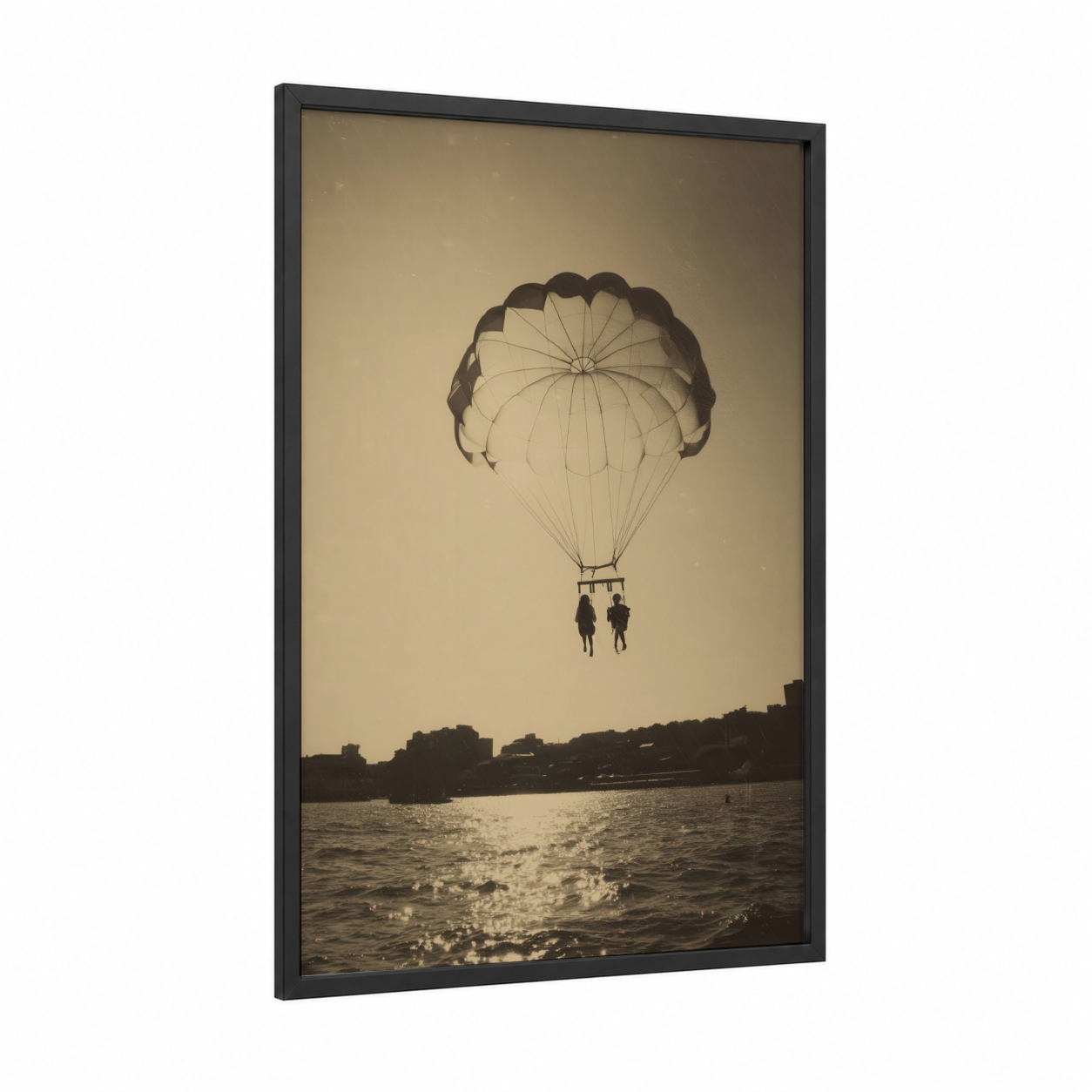 Sunset Parasailing framed art print — black wood frame — gold and black and white palette
