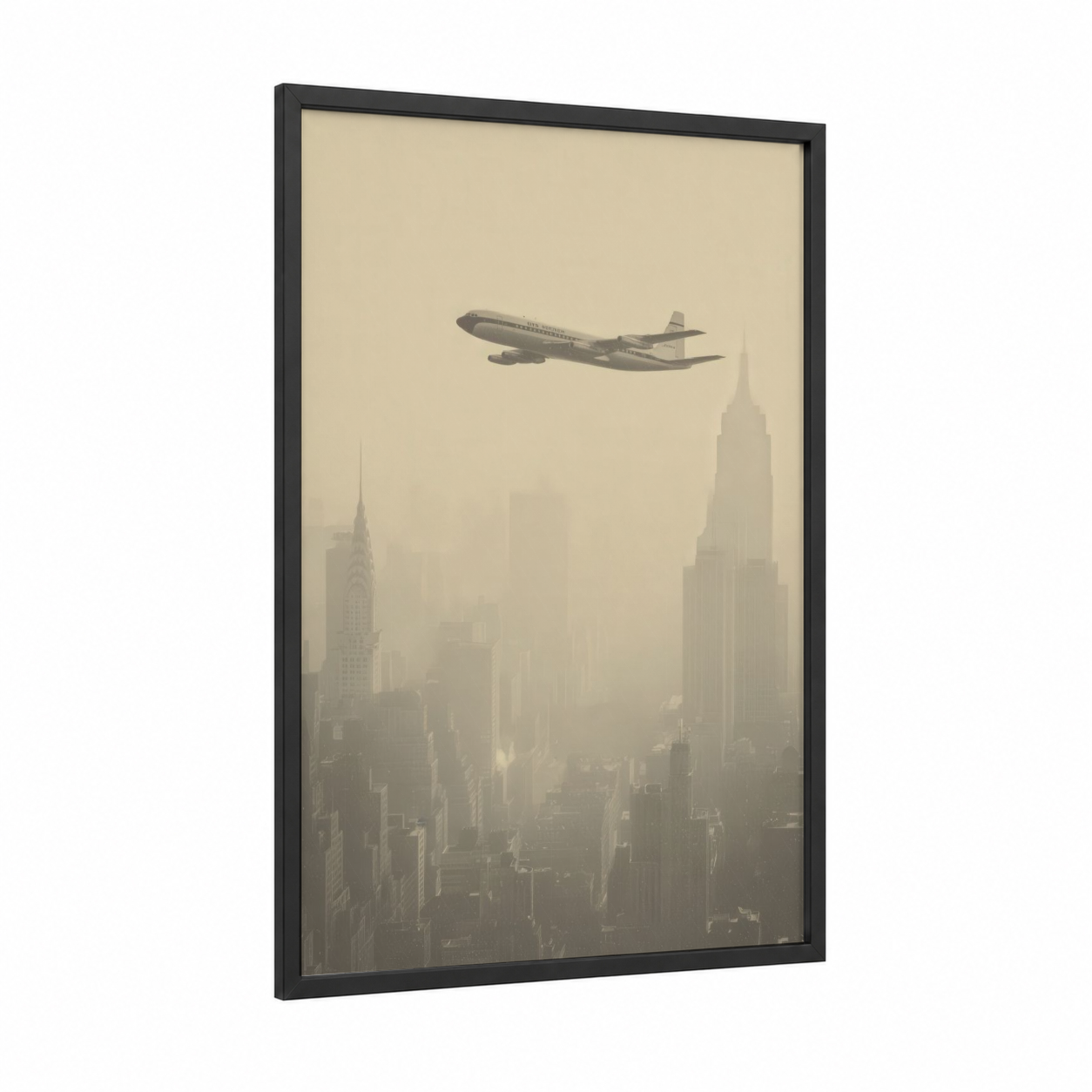 Manhattan Flyover framed commercial plane print — black wood frame — cream and gray palette