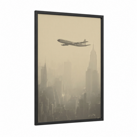 Manhattan Flyover framed commercial plane print — black wood frame — cream and gray palette