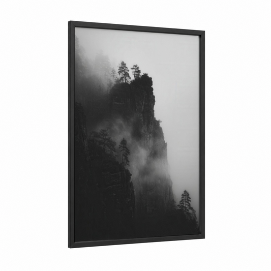 Misty Cliff framed art print — black wood frame — black and white palette