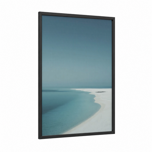 Tranquil Shoreline framed sandy beach print — black wood frame — blue and white palette