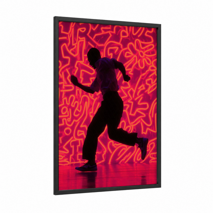 Neon Swing Dancer framed art print — black wood frame — magenta and yellow gold palette