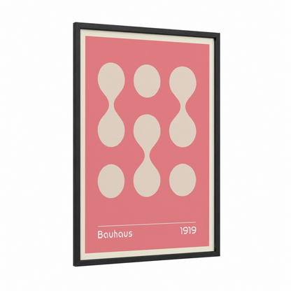 Bauhaus Circles framed abstract geometric print — black wood frame — salmon pink and cream palette