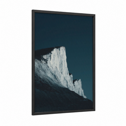 Chalky Coastline framed cliff print — black wood frame — white and dark blue palette