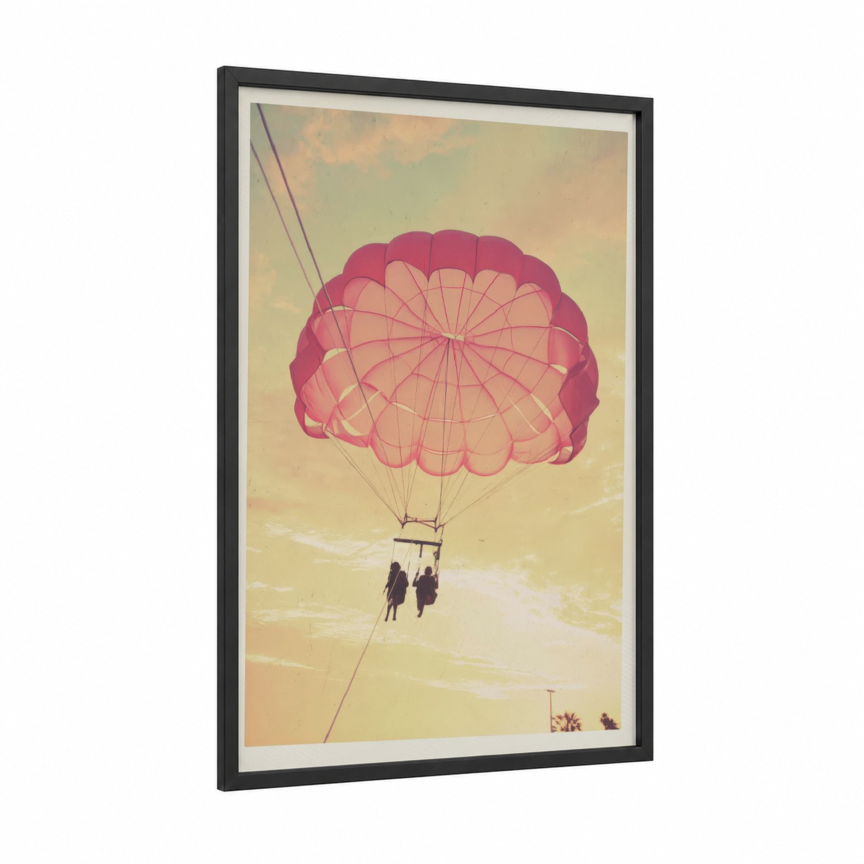 Golden Parasail framed parasailing print — black wood frame — gold and pink palette