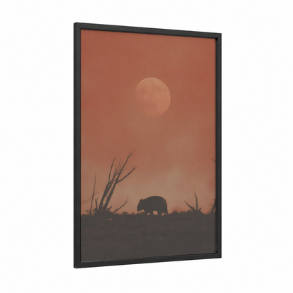 Sunset Wombat framed art print — black wood frame — russet and peach palette