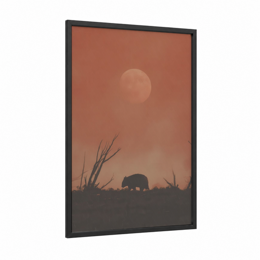 Sunset Wombat framed art print — black wood frame — russet and peach palette