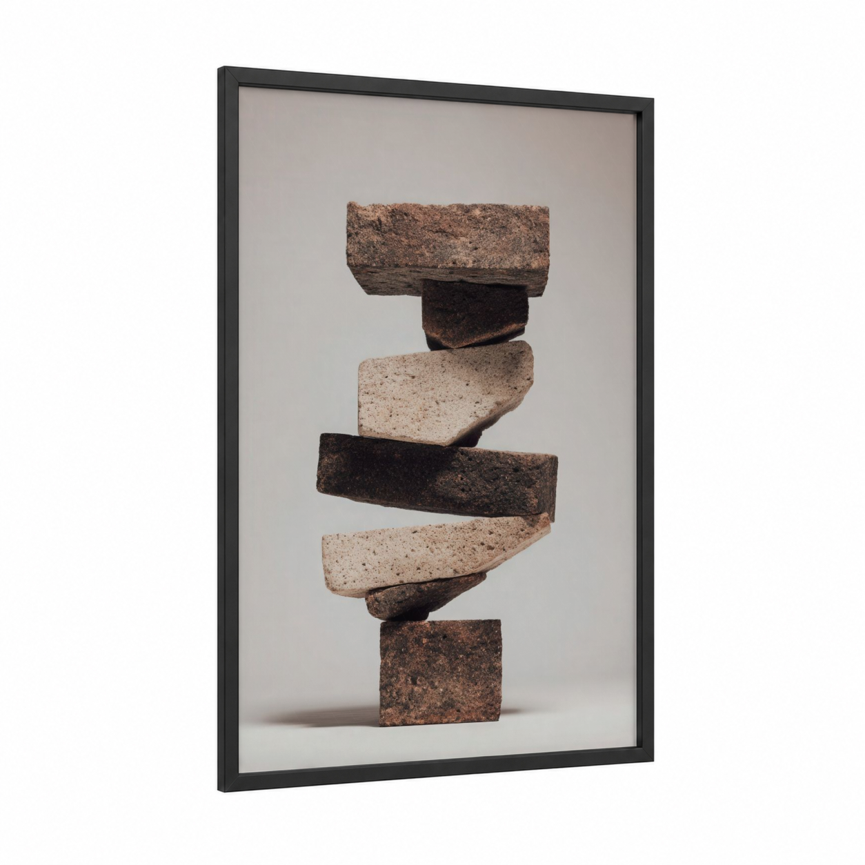 Stacked Stone Balance framed natural stones print — black wood frame — beige and black palette